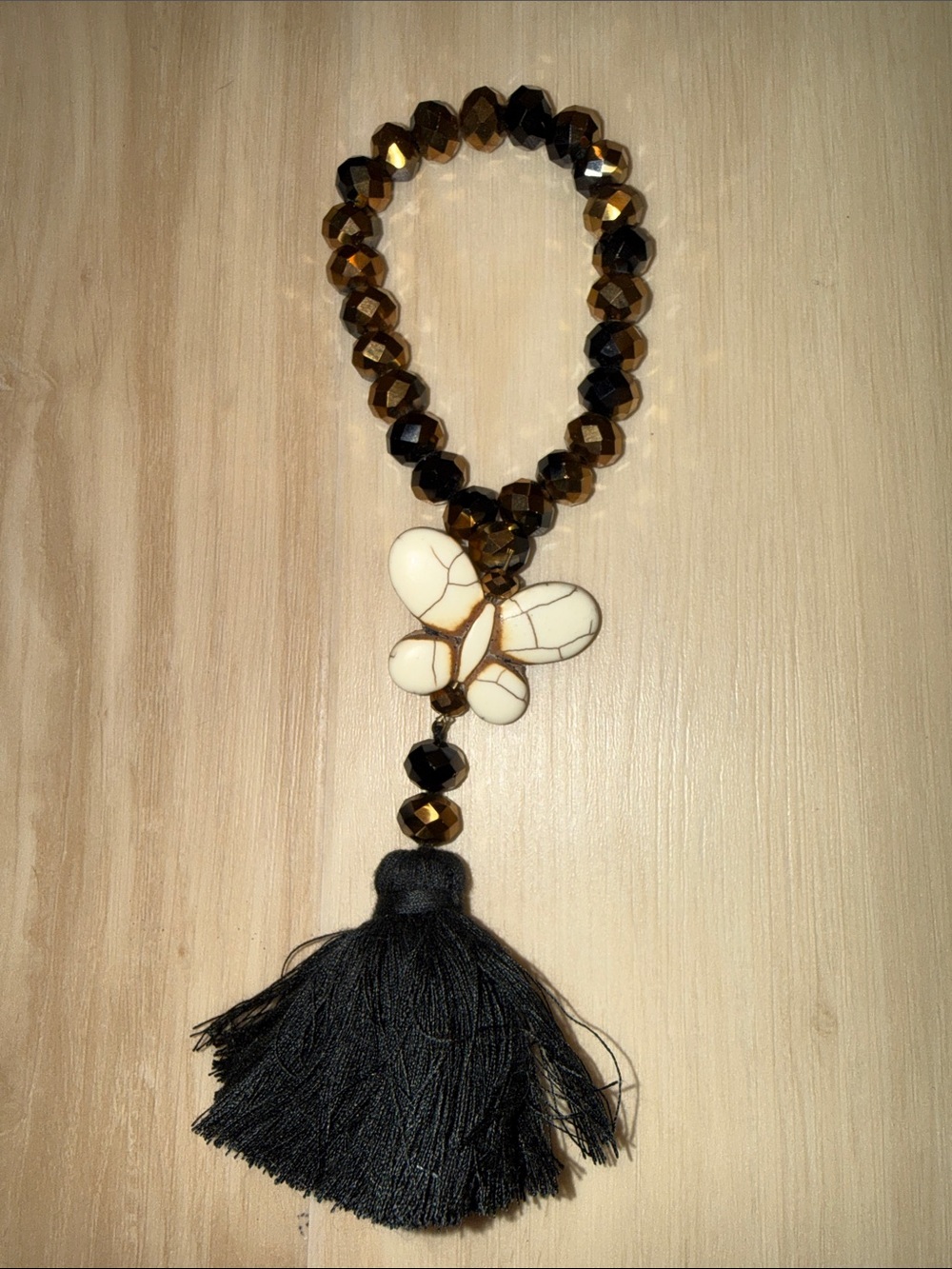 Black Tassel Bracelet with Ivory Butterfly Accent